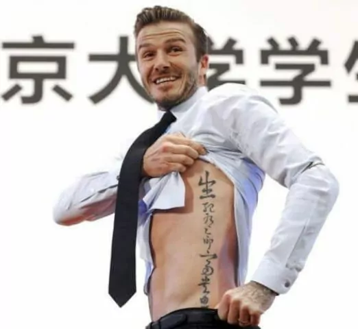 Ý nghĩa hình xăm bên mạn sườn trái của Beckham.